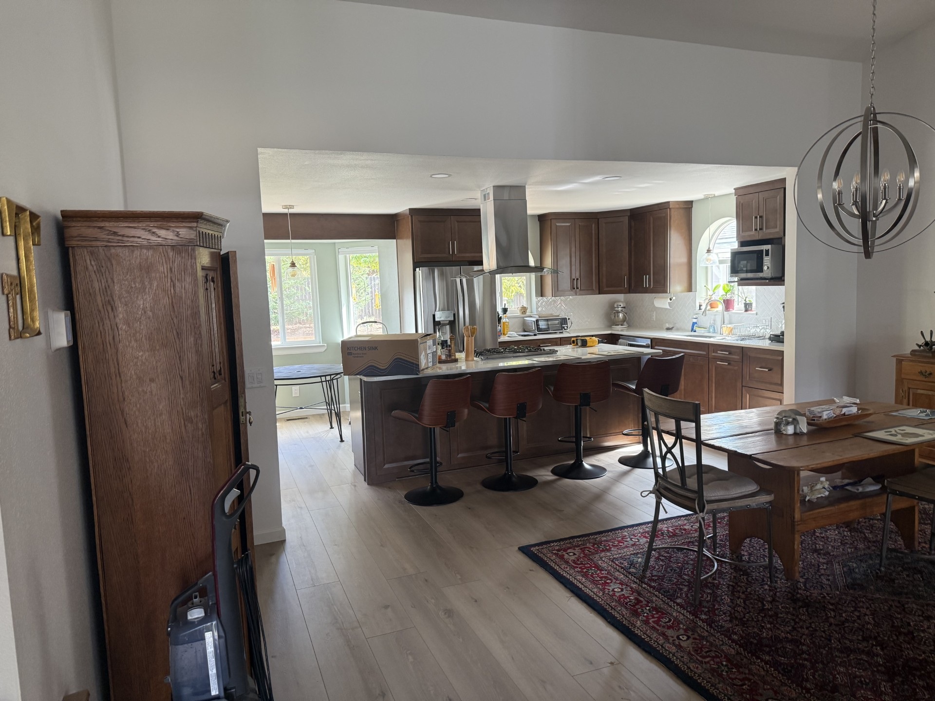Open-concept kitchen remodel in Paradise, CA featuring the removal of a non-load-bearing wall, new kitchen layout, updated cabinetry, countertops, and modern finishes.